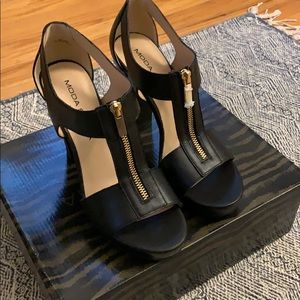 Moda Spana black leather heels